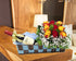 products/wineandflowersArrangement.jpg
